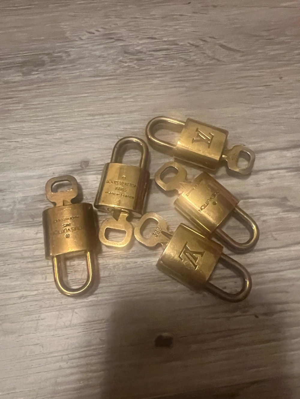 Louis Vuitton Brass Tone Padlock Set in Gold!